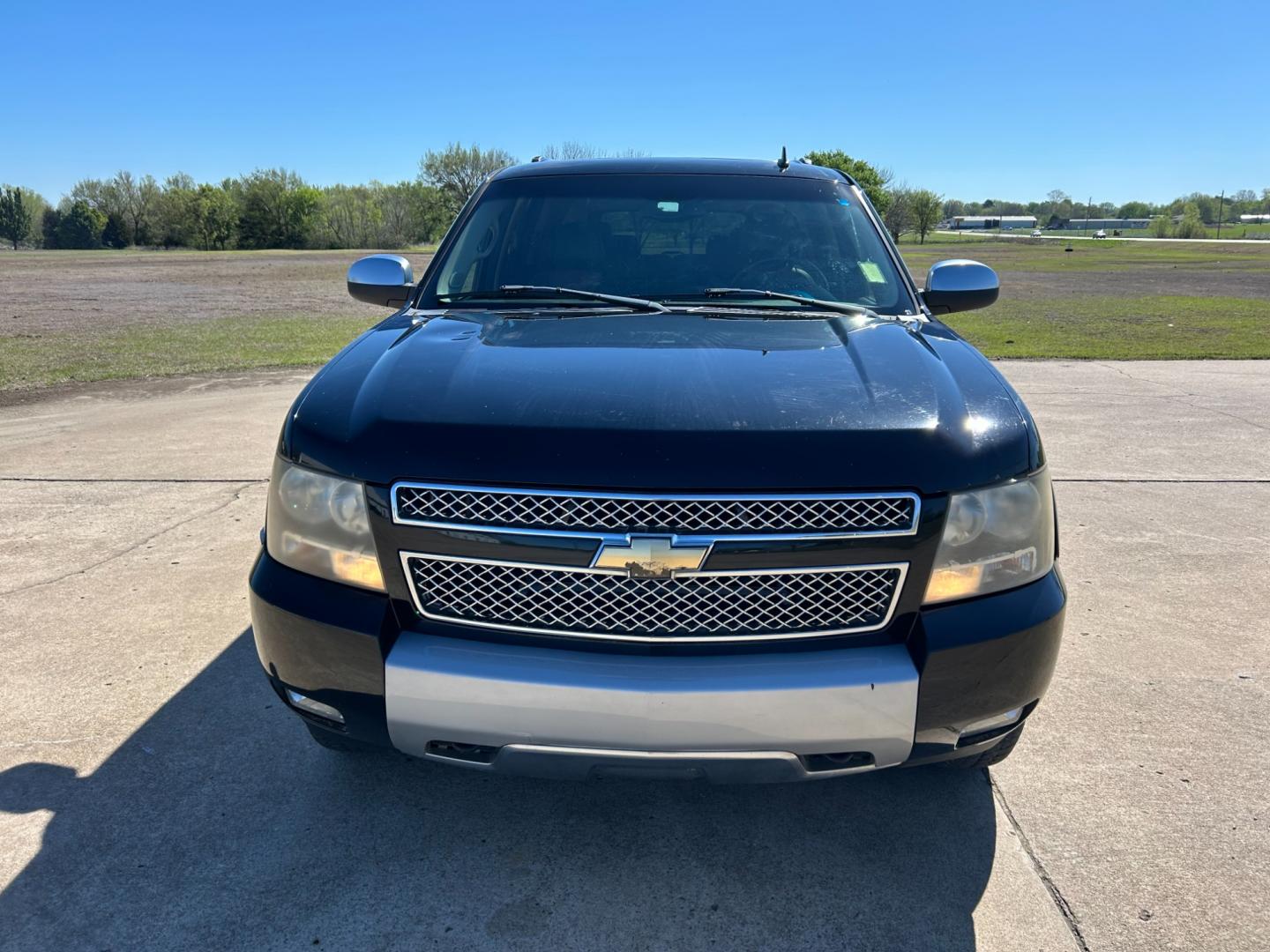 2007 BLACK /BLACK Chevrolet Suburban LS 1500 4WD (3GNFK16377G) with an 5.3L V8 OHV 16V FFV engine, 4-Speed Automatic Overdrive transmission, located at 17760 Hwy 62, Morris, OK, 74445, (918) 733-4887, 35.609104, -95.877060 - Photo#1